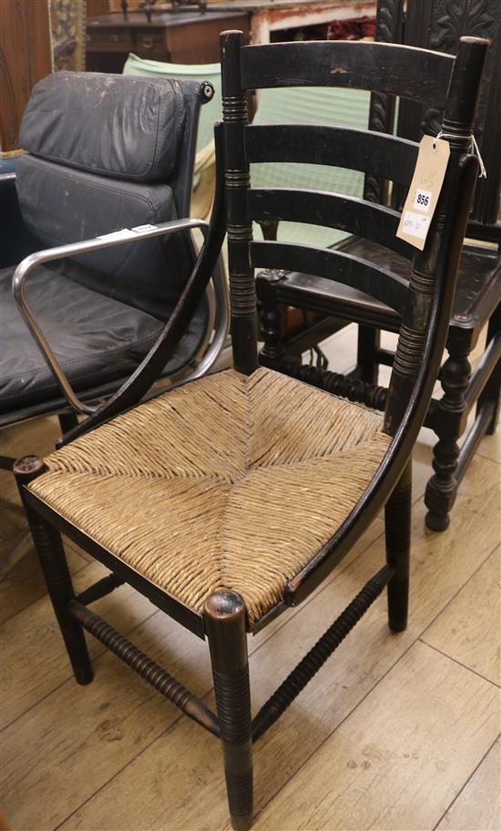 An ebonised chair